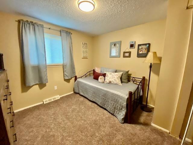 281 Bexford Rd, West Jefferson, OH 43162 - carpeted bedroom with a textured ceiling and baseboards