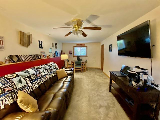 281 Bexford Rd, West Jefferson, OH 43162 - living area with carpet and ceiling fan