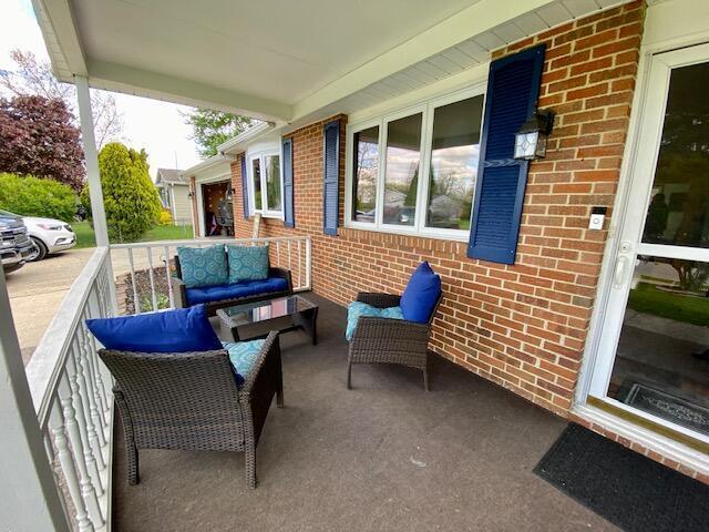 281 Bexford Rd, West Jefferson, OH 43162 - porch with outdoor lounge area