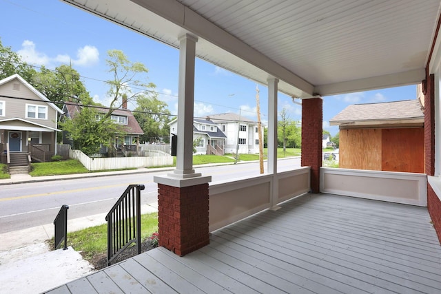 1195 E Whittier St, Columbus, OH 43206 - wooden porch featuring a residential view