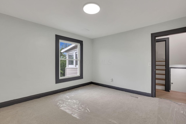 1195 E Whittier St, Columbus, OH 43206 - carpeted empty room featuring baseboards