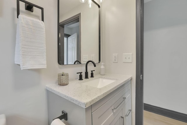 1195 E Whittier St, Columbus, OH 43206 - bathroom with vanity and wood finished floors
