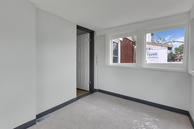 1195 E Whittier St, Columbus, OH 43206 - carpeted spare room with plenty of natural light and baseboards