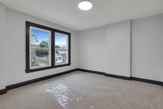 1195 E Whittier St, Columbus, OH 43206 - empty room featuring carpet and baseboards