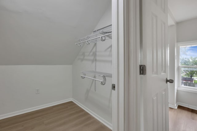 1195 E Whittier St, Columbus, OH 43206 - walk in closet with lofted ceiling and wood finished floors