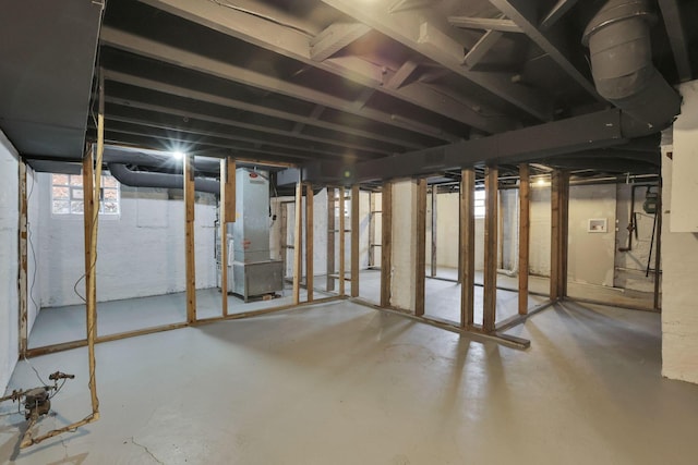 1195 E Whittier St, Columbus, OH 43206 - basement featuring heating unit and healthy amount of natural light