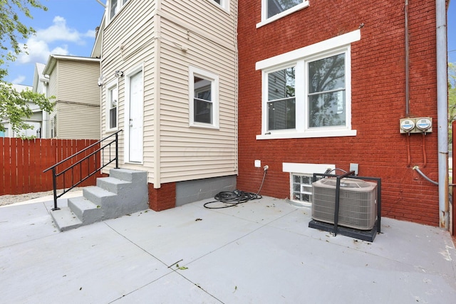 1195 E Whittier St, Columbus, OH 43206 - view of patio with entry steps and cooling unit