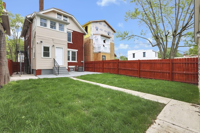1195 E Whittier St, Columbus, OH 43206 - back of house with entry steps and central AC unit