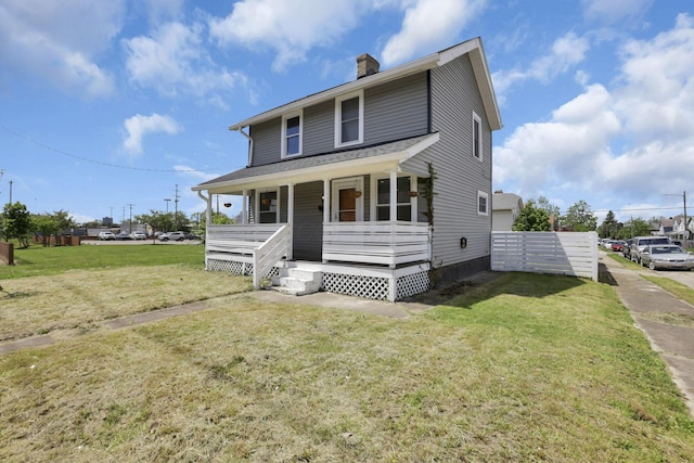 841 Saint Clair Ave, Columbus, OH 43201 - view of front of property featuring a porch, a chimney, and a front lawn