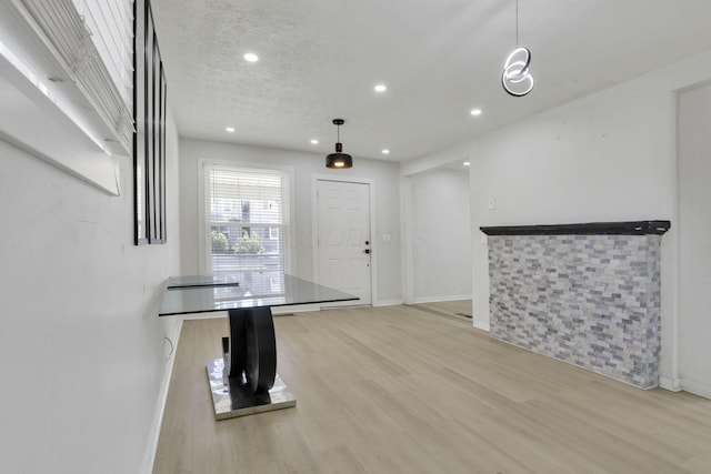 841 Saint Clair Ave, Columbus, OH 43201 - foyer with light wood-type flooring, recessed lighting, baseboards, and a textured ceiling