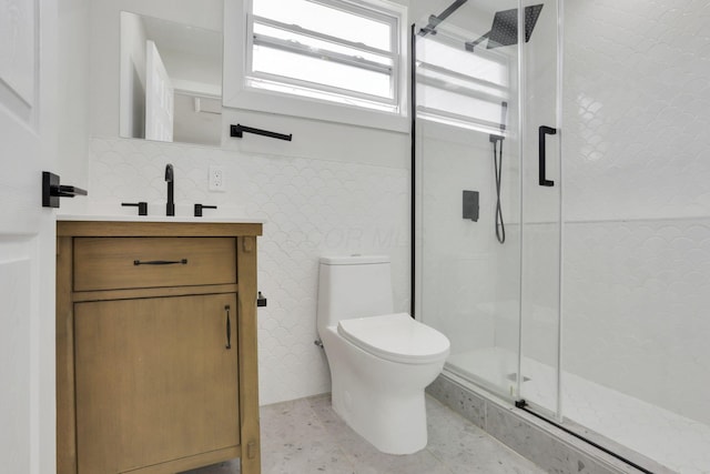 841 Saint Clair Ave, Columbus, OH 43201 - bathroom featuring a shower stall, vanity, and toilet