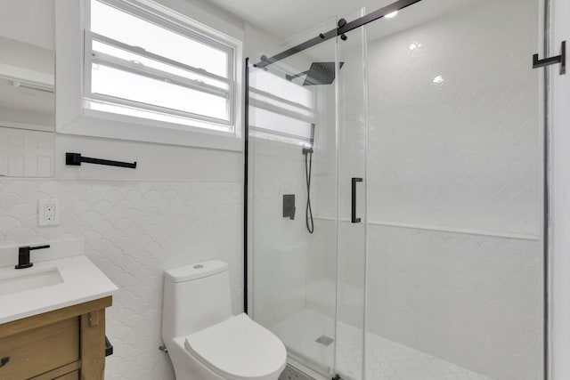 841 Saint Clair Ave, Columbus, OH 43201 - full bath featuring vanity, a shower stall, toilet, and tile walls