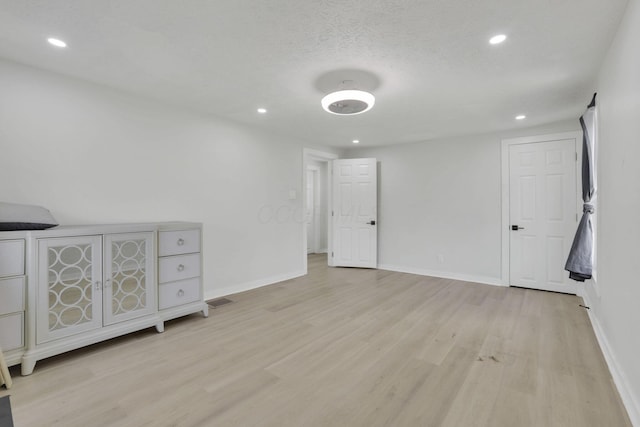 841 Saint Clair Ave, Columbus, OH 43201 - unfurnished bedroom with light wood-type flooring, recessed lighting, and baseboards