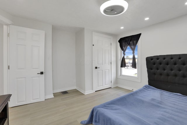 841 Saint Clair Ave, Columbus, OH 43201 - bedroom featuring light wood finished floors, baseboards, and recessed lighting