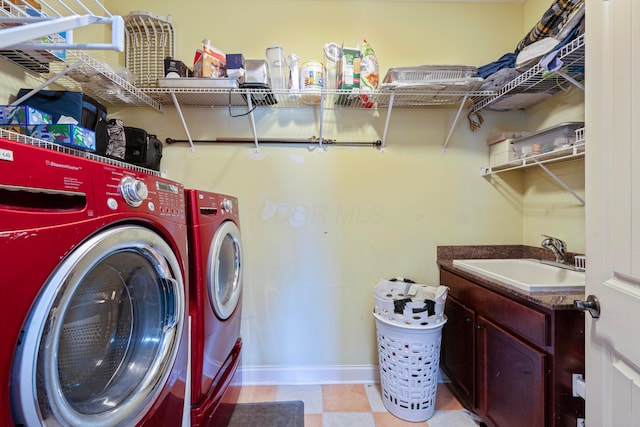 7563 Jenkins Dr, Canal Winchester, OH 43110 - laundry room featuring washer and dryer, baseboards, and cabinet space