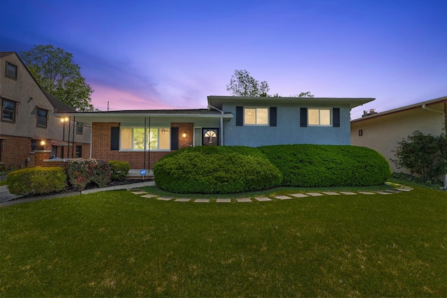 270 S Kellner Rd, Columbus, OH 43209 - split level home featuring a yard and brick siding