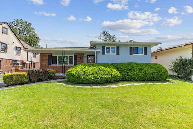 270 S Kellner Rd, Columbus, OH 43209 - split level home with a front lawn and brick siding