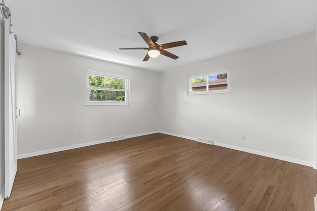 270 S Kellner Rd, Columbus, OH 43209 - empty room featuring healthy amount of natural light, a ceiling fan, wood finished floors, and baseboards