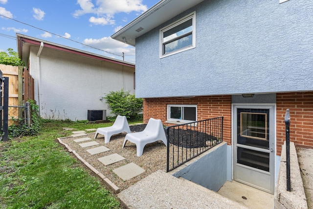 270 S Kellner Rd, Columbus, OH 43209 - back of house with fence, stucco siding, and brick siding