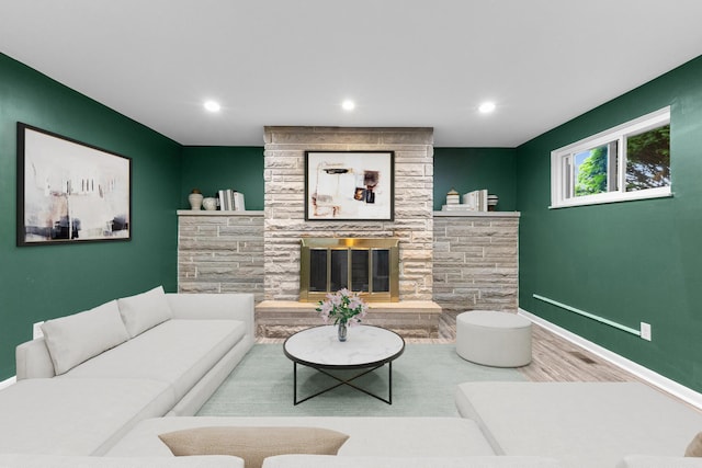 270 S Kellner Rd, Columbus, OH 43209 - living room featuring wood finished floors, baseboards, a fireplace, and recessed lighting