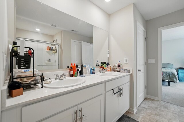 314 Sandburg Dr, Lithopolis, OH 43136 - ensuite bathroom with double vanity, an enclosed shower, baseboards, and marble finish flooring