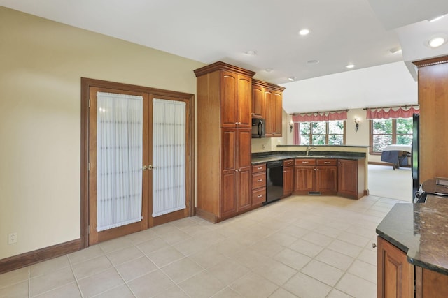 1200 Willow Rd, Springfield, OH 45502 - kitchen featuring black appliances, a sink, french doors, a peninsula, and recessed lighting