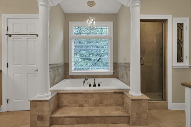 1200 Willow Rd, Springfield, OH 45502 - bathroom with a bath, tile patterned flooring, a stall shower, ornate columns, and a chandelier