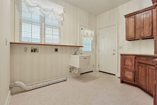 1200 Willow Rd, Springfield, OH 45502 - laundry area featuring electric dryer hookup, cabinet space, and hookup for a washing machine