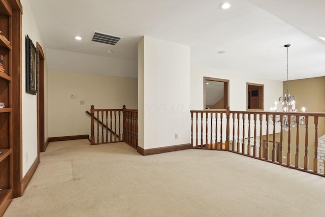 1200 Willow Rd, Springfield, OH 45502 - corridor with an upstairs landing, light carpet, a chandelier, recessed lighting, and baseboards