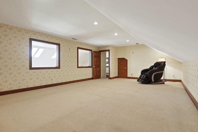 1200 Willow Rd, Springfield, OH 45502 - unfurnished room featuring light colored carpet, baseboards, plenty of natural light, wallpapered walls, and lofted ceiling