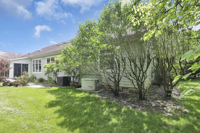 1200 Willow Rd, Springfield, OH 45502 - view of grassy yard with cooling unit