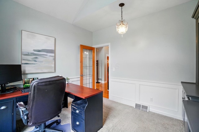 5741 Ridgewood Ave, Westerville, OH 43082 - office featuring carpet floors, a wainscoted wall, a chandelier, and a decorative wall