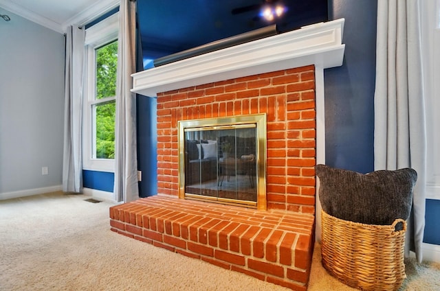 5741 Ridgewood Ave, Westerville, OH 43082 - detailed view of a brick fireplace, baseboards, crown molding, and carpet flooring