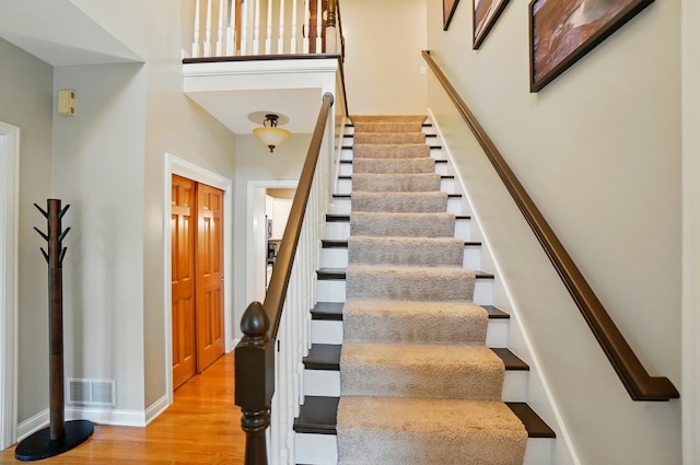 5741 Ridgewood Ave, Westerville, OH 43082 - staircase featuring wood finished floors and baseboards