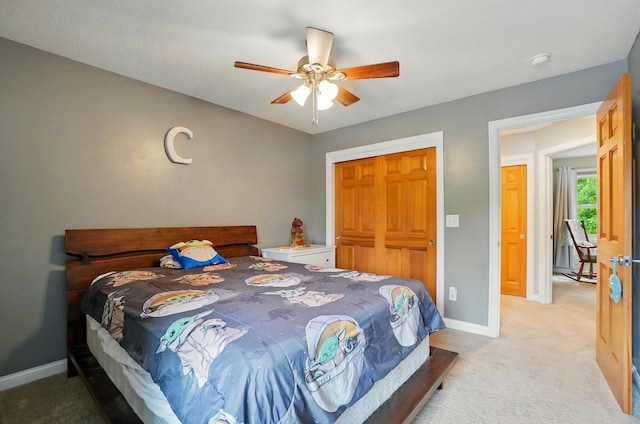 5741 Ridgewood Ave, Westerville, OH 43082 - bedroom with light colored carpet, baseboards, and ceiling fan
