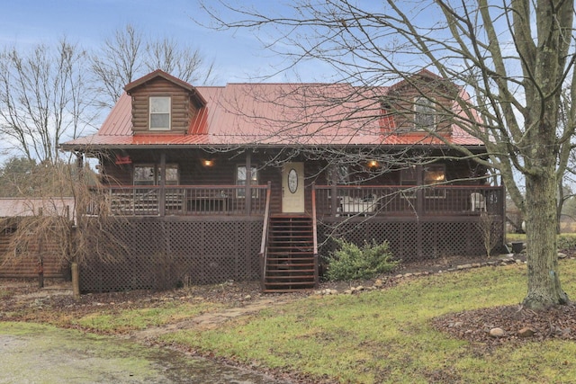 7760 Township Rd 177, Fredericktown, OH 43019 - log-style house featuring covered porch, stairway, and metal roof