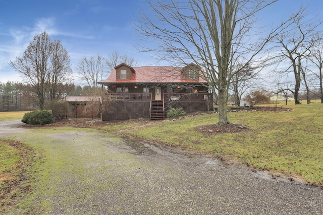 7760 Township Rd 177, Fredericktown, OH 43019 - view of front facade featuring stairs, a front lawn, and covered porch