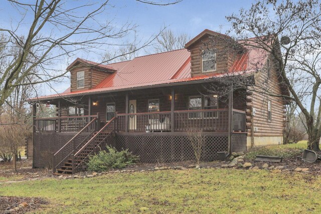 7760 Township Rd 177, Fredericktown, OH 43019 - cabin featuring log siding, covered porch, a front lawn, and stairway