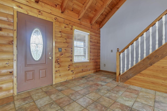 7760 Township Rd 177, Fredericktown, OH 43019 - foyer featuring wooden ceiling, healthy amount of natural light, stairway, stone finish flooring, and baseboards