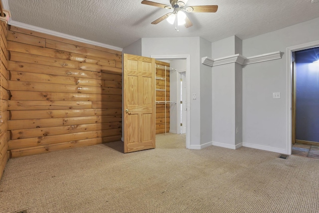 7760 Township Rd 177, Fredericktown, OH 43019 - unfurnished bedroom with light colored carpet, baseboards, a textured ceiling, and a ceiling fan