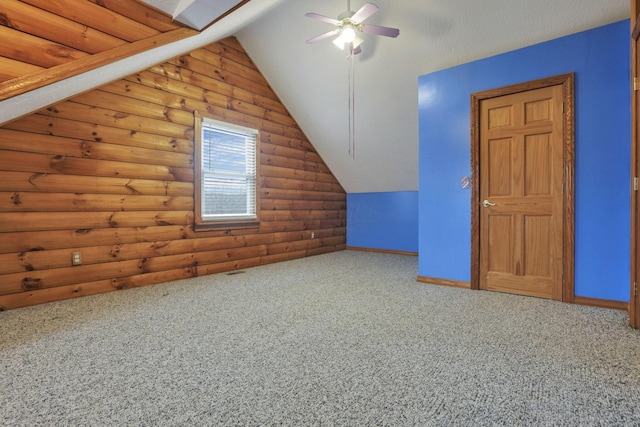 7760 Township Rd 177, Fredericktown, OH 43019 - bonus room with log walls, carpet, a ceiling fan, lofted ceiling, and baseboards