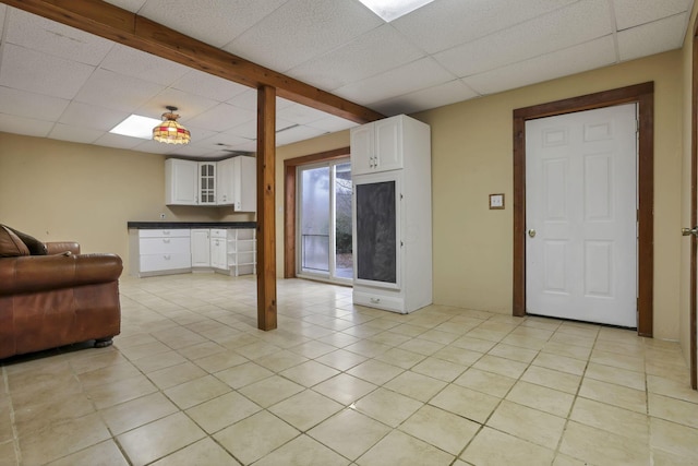 7760 Township Rd 177, Fredericktown, OH 43019 - living room with a drop ceiling and light tile patterned flooring