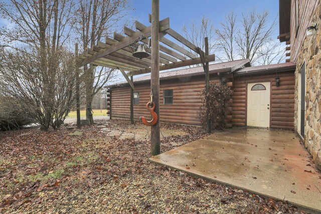 7760 Township Rd 177, Fredericktown, OH 43019 - exterior space featuring log exterior and a pergola