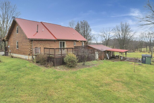 7760 Township Rd 177, Fredericktown, OH 43019 - back of property with log exterior, a deck, a lawn, metal roof, and a carport