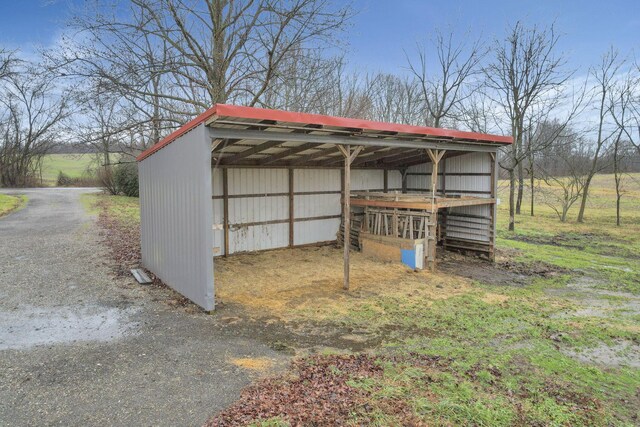 7760 Township Rd 177, Fredericktown, OH 43019 - view of pole building featuring a carport and driveway