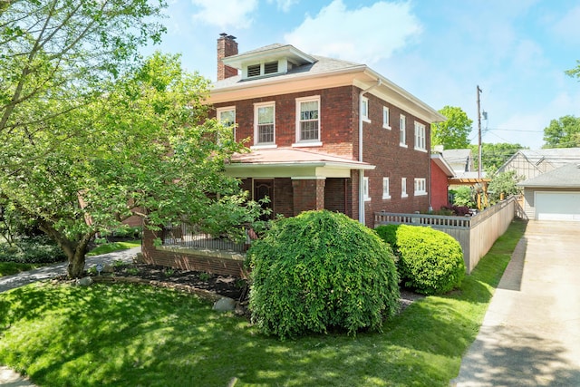 2454 Seneca Park Pl, Columbus, OH 43209 - traditional style home with a chimney and brick siding