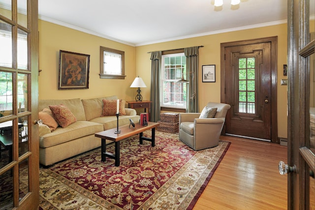 2454 Seneca Park Pl, Columbus, OH 43209 - living room with ornamental molding and light wood finished floors