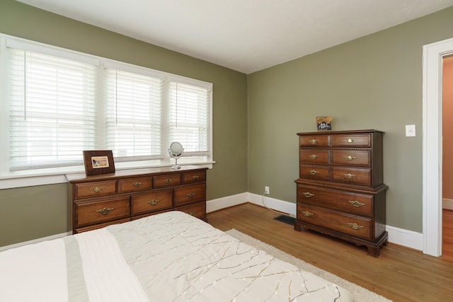 2454 Seneca Park Pl, Columbus, OH 43209 - bedroom with light wood-type flooring and baseboards
