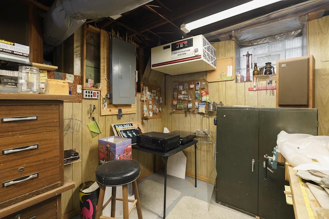 2454 Seneca Park Pl, Columbus, OH 43209 - below grade area featuring electric panel, wood walls, and a heating unit