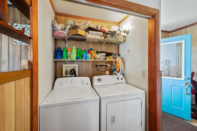 316 Hensley St, Galion, OH 44833 - laundry room featuring washing machine and clothes dryer, carpet flooring, and ornamental molding